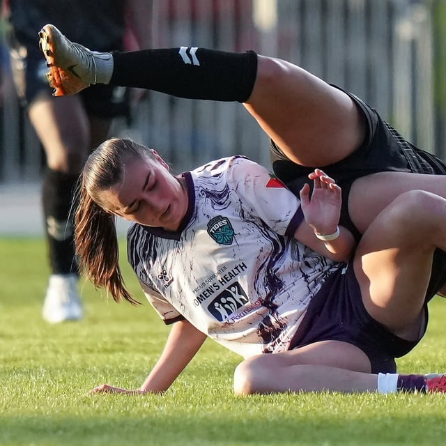 Halifax Tides' Eva Fremaux, front left, and Vancouver Rise's Nedya Sawan collide during the first half of an NSL soccer match, in Burnaby, B.C., on Monday, May 5, 2025. THE CANADIAN PRESS/Darryl Dyck