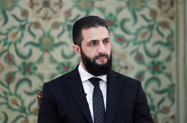 Syria’s interim President Ahmed al-Sharaa attends an interview with Reuters at the presidential palace, in Damascus, Syria March 10, 2025. REUTERS/Khalil Ashawi/File Photo