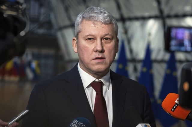 FILE - Romanian Interior Minister Catalin Predoiu speaks to the media at the European Council building in Brussels, Dec 12, 2024. (AP Photo/Omar Havana, File)