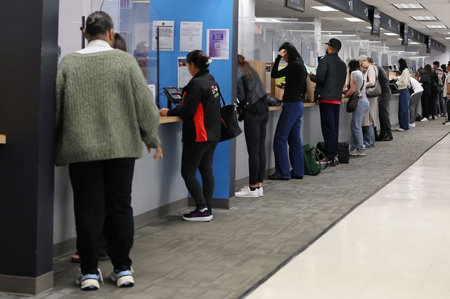 People line up at the state Department of Motor Vehicles on April 28 in New York City, ahead of the deadline to apply for a REAL ID.