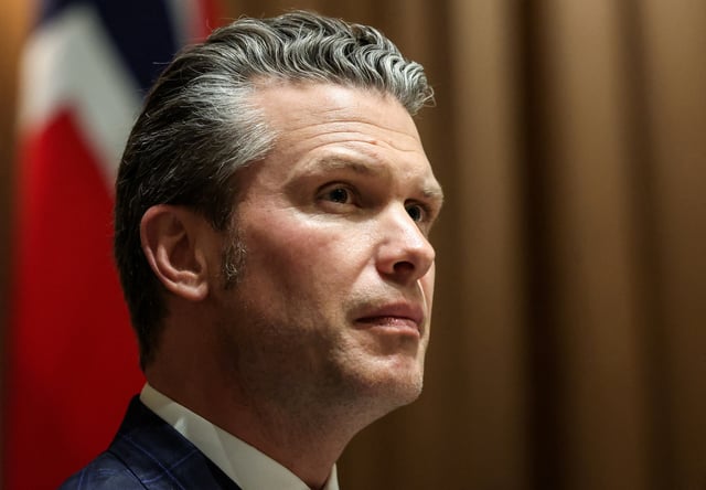 U.S. Defense Secretary Pete Hegseth attends a meeting of U.S. President Donald Trump and Norway's  Prime Minister Jonas Gahr Stoere (not pictured), at the White House, in Washington, D.C., U.S., April 24, 2025. REUTERS/Kevin Lamarque/File Photo