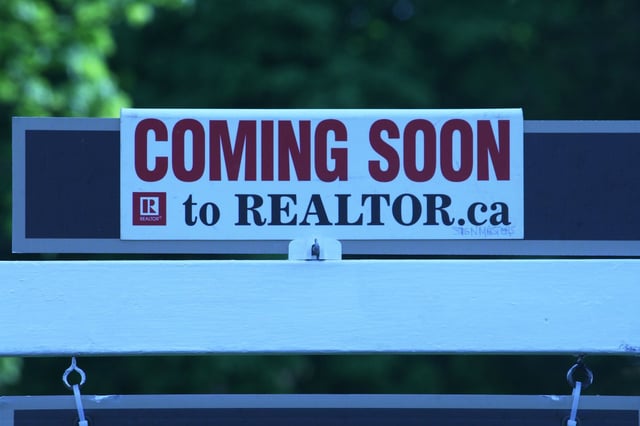 Home sales in the Greater Toronto Area were down 23.3 per cent in April amid continued uncertainty over the economy. Real estate signage is shown in Oakville, Ont., west of Toronto on Saturday, May 11, 2024. THE CANADIAN PRESS/Richard Buchan