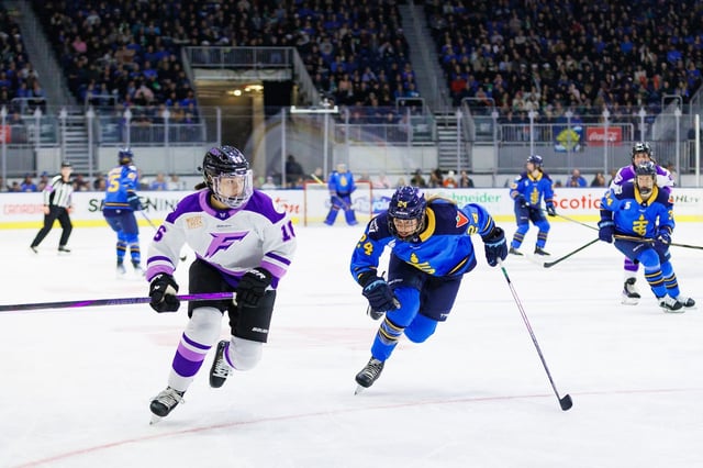 Toronto Sceptres' Natalie Spooner (24) chases after Minnesota Frosts' Sophie Jaques (16) during the second period of their PWHL hockey game, in Toronto, Tuesday, Feb. 11, 2025. THE CANADIAN PRESS/Cole Burston