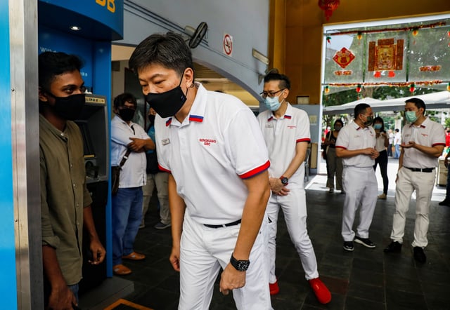 Ng Chee Meng of the People's Action Party (PAP) participates in a walkabout ahead of the general election in Singapore June 28, 2020. REUTERS/Edgar Su
