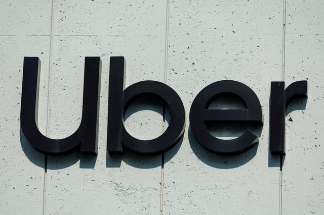 The Uber logo is shown on the building in Los Angeles, California, U.S., February 14, 2024.  REUTERS/Mike Blake/File Photo