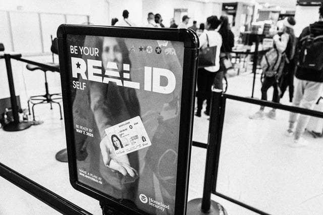 A Homeland Security REAL ID message in  Miami International Airport in 2024.