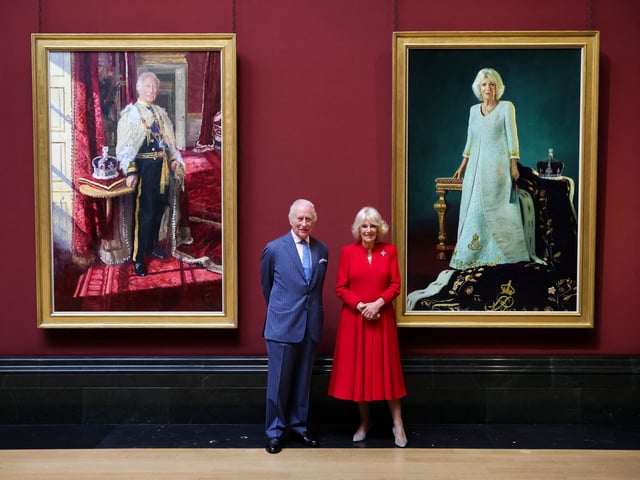 Britain's King Charles and Queen Camilla pose with their official Coronation State Portraits during a visit to the National Gallery, in London, Britain, May 6, 2025. Chris Jackson/Pool via REUTERS