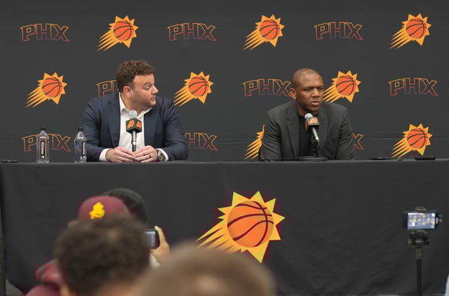 Phoenix Suns CEO Josh Bartelstein (left) and general manager James Jones talk about the 2024-25 season during a news conference at Verizon 5G Performance Center in Phoenix on April 17, 2025.