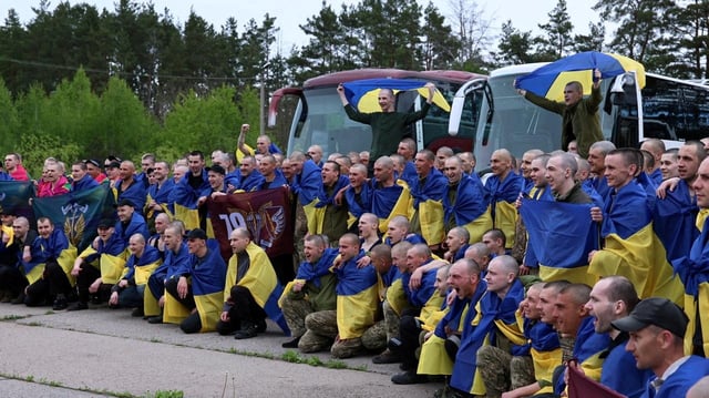 Ukrainian prisoners of war (POWs) are seen after a swap, amid Russia's attack on Ukraine, at an unknown location in Ukraine, in this handout picture released May 6, 2025. Ukraine's President Volodymyr Zelenskiy Via Telegram/via REUTERS