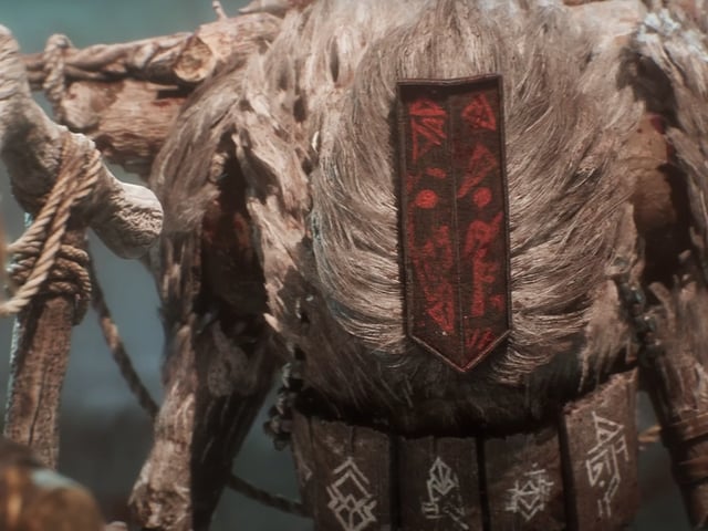 Monoco from Clair Obscur: Expedition 33 stares with an unassailable masked expression.