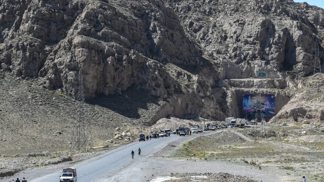 A general view shows the Lakpass Tunnel (R) blocked with shipping containers by the Pakistani authorities during the ongoing sit-in protest by the Balochistan National Party Mengal (BNP-M).