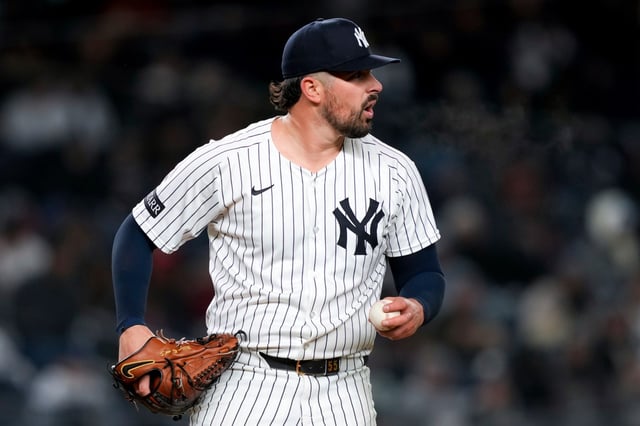 New York Yankees pitcher Carlos Rodón reacts after throwing during a baseball game against the Arizona Diamondbacks, Wednesday, April 2, 2025, in New York. (AP Photo/Julia Demaree Nikhinson)