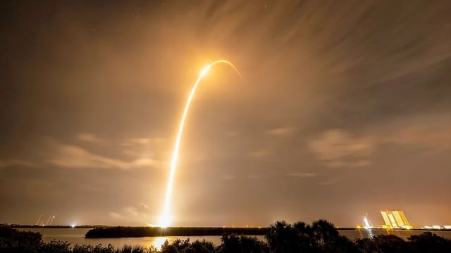 SpaceX Falcon 9 rocket carrying 29 Starlink satellites lifting off from NASA's Kennedy Space Center