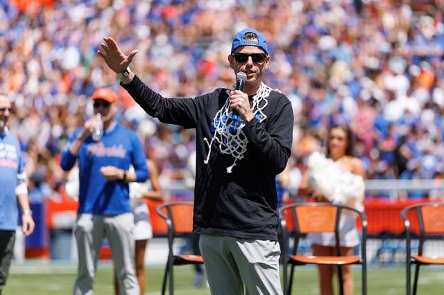 Apr 12, 2025; Gainesville, FL, USA; Florida Gators head coach Todd Golden gestures while speaking to the crowd during the National Championship celebration at Ben Hill Griffin Stadium. Mandatory Credit: Matt Pendleton-Imagn Images/File Photo