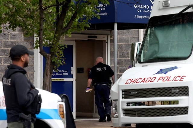Chicago police investigate the scene after an officer fatally shot a male with a knife early Monday morning inside the Grand Regency of Jackson Park, an assisted living facility in the 1400 block of East 75th Street, on May 5, 2025.  (Antonio Perez/Chicago Tribune)