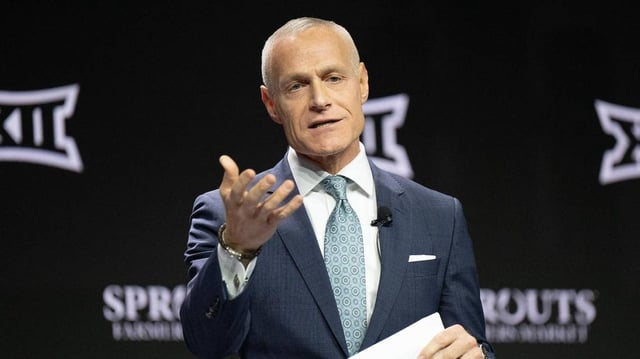 Brett Yormark, commissioner of Big 12, answers questions from the media during Big 12 Media Day at T-Mobile Center on Tuesday, Oct. 22, 2024, in Kansas City.