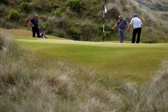 People play golf at the Trump International Golf Links in Aberdeen, Scotland, June 25, 2016.  REUTERS/Carlo Allegri/File Photo