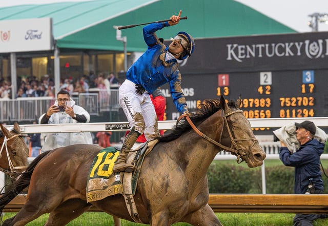 Jockey Junior Alvarado celebrates after riding Sovereignty to victory in the 151st Kentucky Derby at Churchill Downs in Louisville, Kentucky, on May 3, 2025.