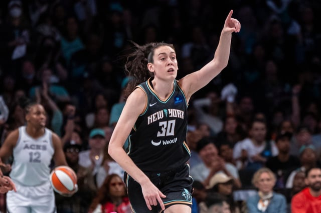 New York Liberty forward Breanna Stewart (30) celebrates a basket during the second half of a WNBA basketball semifinal game against the Las Vegas Aces, Sunday, Sept. 29, 2024, in New York. (AP Photo/Corey Sipkin)