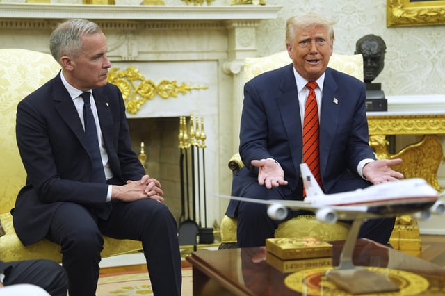 President Donald Trump meets Canadian Prime Minister Mark Carney in the Oval Office of the White House, Tuesday, May 6, 2025, in Washington. (AP Photo/Evan Vucci)