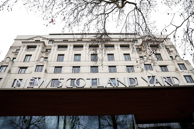 A general view of a signage outside New Scotland Yard, the headquarters of the Metropolitan Police, in London, Britain March 21, 2023. REUTERS/Peter Nicholls/File Photo