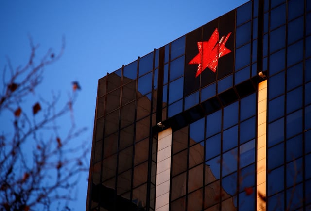 The logo of National Australia Bank adorns their headquarters building in central Sydney, Australia June 22, 2017. REUTERS/David Gray/File Photo