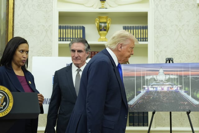 President Donald Trump, from right, departs as Interior Secretary Doug Burgum and District of Columbia Mayor Muriel Bowser look on after an event to announce that the 2027 NFL Draft will be held on the National Mall, in the Oval Office of the White House, Monday, May 5, 2025, in Washington. (AP Photo/Alex Brandon)