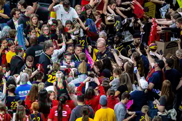 Indiana Fever guard Caitlin Clark (22) signs autographs Sunday, May 4, 2025, during a preseason game between the Indiana Fever and the Brazil national team at Carver-Hawkeye Arena in Iowa City. The Indiana Fever defeated the Brazilian National Team, 108-44. Grace Smith/IndyStar / USA TODAY NETWORK via Imagn Images