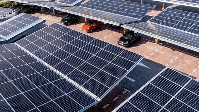 The government estimates that an owner of a 80-space car park could save about £28,000 on electricity bills by installing solar canopies