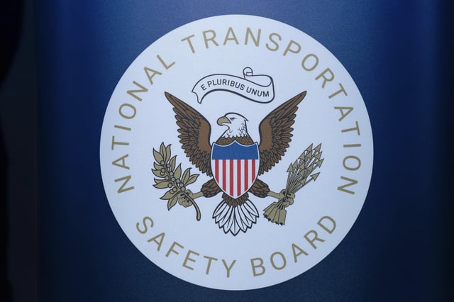FILE - The seal of the National Transportation Safety Board is seen before a news conference at Ronald Reagan Washington National Airport, Jan. 31, 2025, in Arlington, Va. (AP Photo/Jose Luis Magana, File)