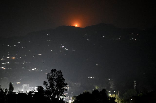 A flare goes up in air over the hill near main town of Poonch district, on May 7, 2025. India said on May 7 it carried out &#34;precision strikes at terrorist camps&#34; inside Pakistan and Pakistani-controlled Kashmir, days after it blamed Islamabad for a deadly attack on the Indian side of the contested region. (Photo by Punit PARANJPE / AFP) (Photo by PUNIT PARANJPE/AFP via Getty Images)