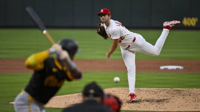 May 6, 2025; St. Louis, Missouri, USA;  St. Louis Cardinals starting pitcher Matthew Liberatore (52) pitches against Pittsburgh Pirates designated hitter Andrew McCutchen (22) during the third inning at Busch Stadium. Mandatory Credit: Jeff Curry-Imagn Images