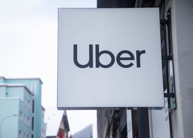 The logo of Uber is seen at a temporary showroom at the Promenade road during the World Economic Forum (WEF) 2023, in the Alpine resort of Davos, Switzerland, January 20, 2023. REUTERS/Arnd Wiegmann/File photo