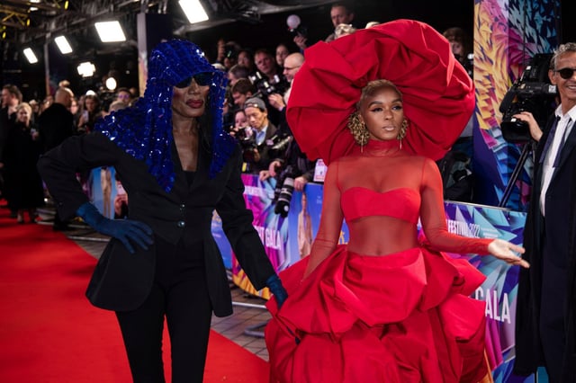 Janelle Monae, right, and Grace Jones pose for photographers upon arrival for the premiere of the film &#39;Glass Onion: A Knives Out Mystery&#39; and the closing evening of the 2022 London Film Festival in London, Sunday, Oct. 16, 2022. (Photo by Vianney Le Caer/Invision/AP)