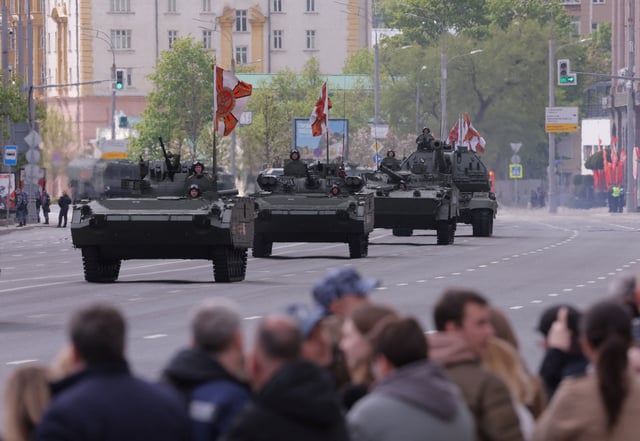 Russian armoured infantry carriers, including fighting vehicles BMP-1AM Basurmanin, drive along a road on the day of a rehearsal for a military parade, which marks the 80th anniversary of the victory over Nazi Germany in World War Two, in central Moscow, Russia, May 7, 2025. REUTERS/Anton Vaganov