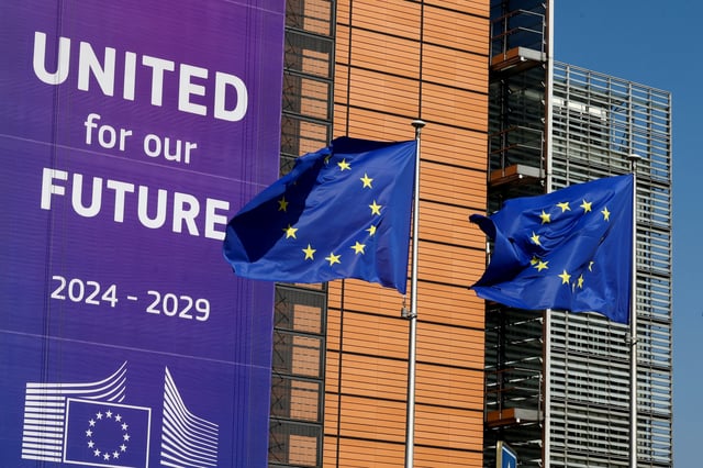 European Union flags flutter outside the European Commission headquarters in Brussels, Belgium April 9, 2025. REUTERS/Yves Herman