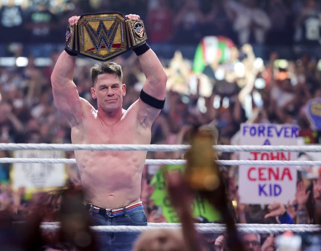 LAS VEGAS, NEVADA - APRIL 20: John Cena celebrates after his victory over Cody Rhodes to win the Undisputed WWE Championship during WrestleMania 41 at Allegiant Stadium on April 20, 2025 in Las Vegas, Nevada.