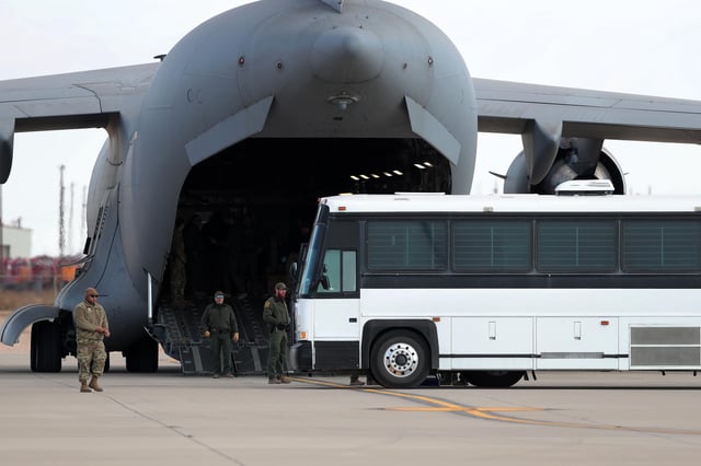 In this January 30 photo, migrants are deported using a US military plane in El Paso, Texas.