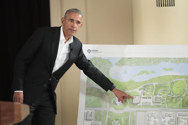 Former President Barack Obama points out features of the proposed Obama Presidential Center, which is scheduled to be built in nearby Jackson Park, during a gathering at the South Shore Cultural Center on May 3, 2017 in Chicago, Illinois.
