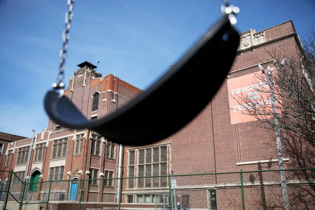 A swing sits empty on a playground outside  in Providence, R.I., March 7, 2020. Columbia University&#39;s Center on Poverty and Social Policy estimates that the number of children in poverty grew by 3.7 million from Dec. 2021 to Jan. 2022, a 41% increase, just one month without the expanded child tax credit payments.