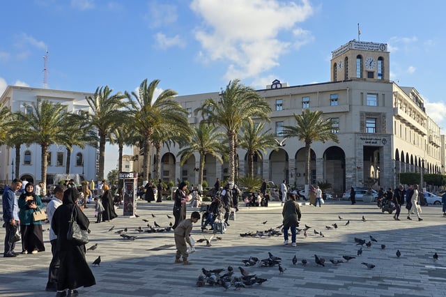 People walk around in Tripoli's Martyrs Square, Libya, on April 28, 2025.  