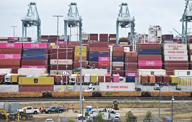 Shipping containers are stacked at the Port of Los Angeles, California, on May 6, 2025.