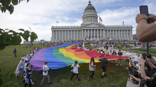 FILE - People march following a Pride rally at the Utah State Capitol, June 2, 2023, in Salt Lake City. (AP Photo/Rick Bowmer, File)