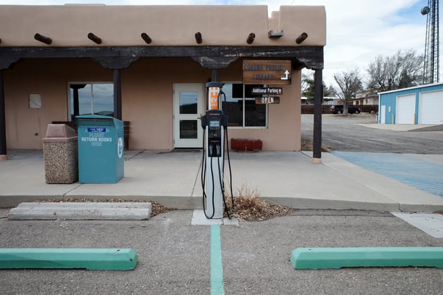 A Chargepoint level 2 electric vehicle (EV) charging station is seen outside the Corona Public Library in Corona, New Mexico, U.S., March 15, 2023. REUTERS/Bing Guan/File Photo