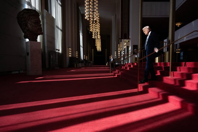 President Donald Trump walks though the Hall of Nation as he visits the John F. Kennedy Center for the Performing Arts in Washington, DC, on March 17.