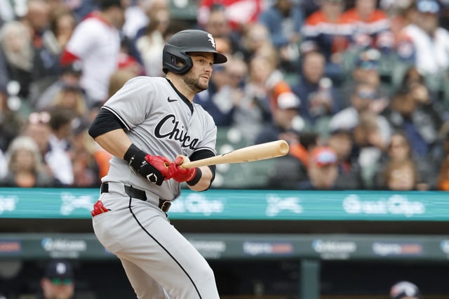 Apr 4, 2025; Detroit, Michigan, USA;  Chicago White Sox outfielder Andrew Benintendi (23) hits a single in the fifth inning against the Detroit Tigers at Comerica Park. Mandatory Credit: Rick Osentoski-Imagn Images/File Photo