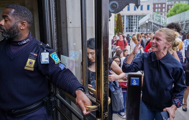 A pro-Palestinian protester yells to let students out of the Butler Library on the campus of Columbia University in New York, U.S., May 7, 2025. REUTERS/Ryan Murphy