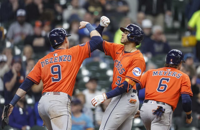 Houston Astros&#39; Jeremy Pena (3) reacts with Zach Dezenzo after hitting a three-run home run against the Milwaukee Brewers during the sixth inning of a baseball game, Wednesday, May 7, 2025, in Milwaukee. (AP Photo/Jeffrey Phelps)