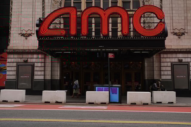 An AMC theatre is pictured in Times Square in the Manhattan borough of New York City, New York, U.S., June 2, 2021.  REUTERS/Carlo Allegri/File Photo