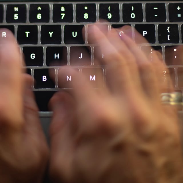 A man uses a computer keyboard in Toronto in this Sunday, Oct. 9 photo illustration. THE CANADIAN PRESS/Graeme Roy
